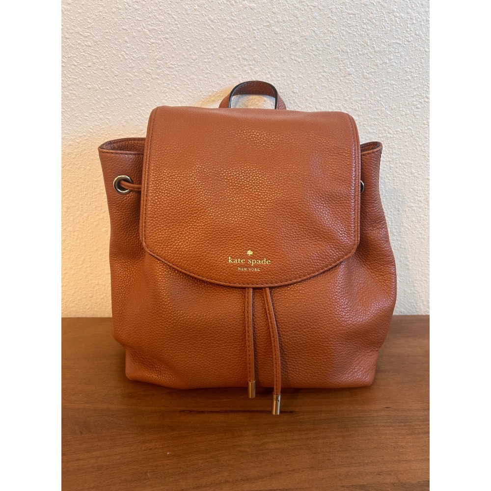 Kate Spade New York Pebbled Leather Drawstring Flap Backpack Cognac Brown Gold